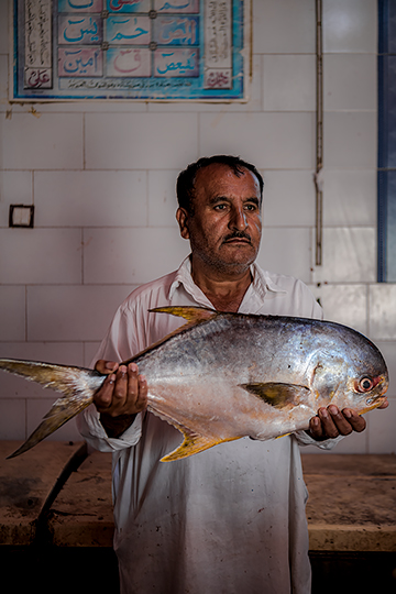 A fishmonger in the bazaar of Chabahar.